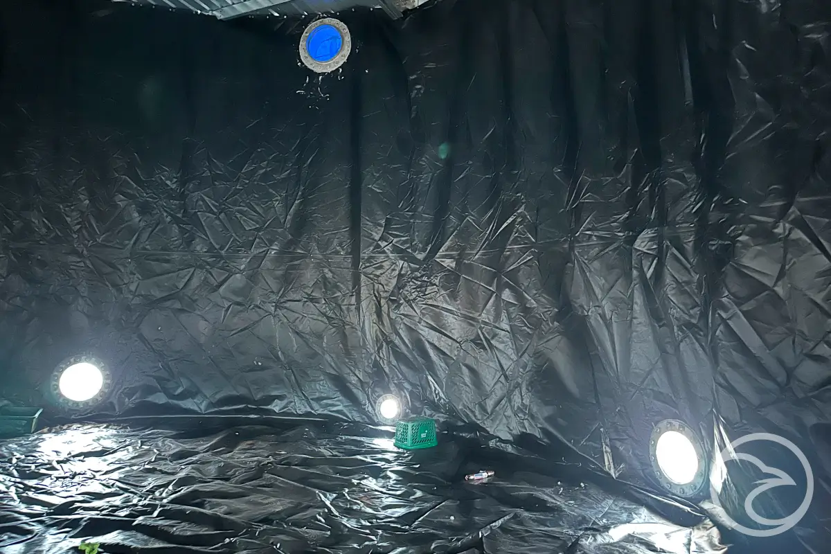 Durable void liners installed in industrial water containment tank
