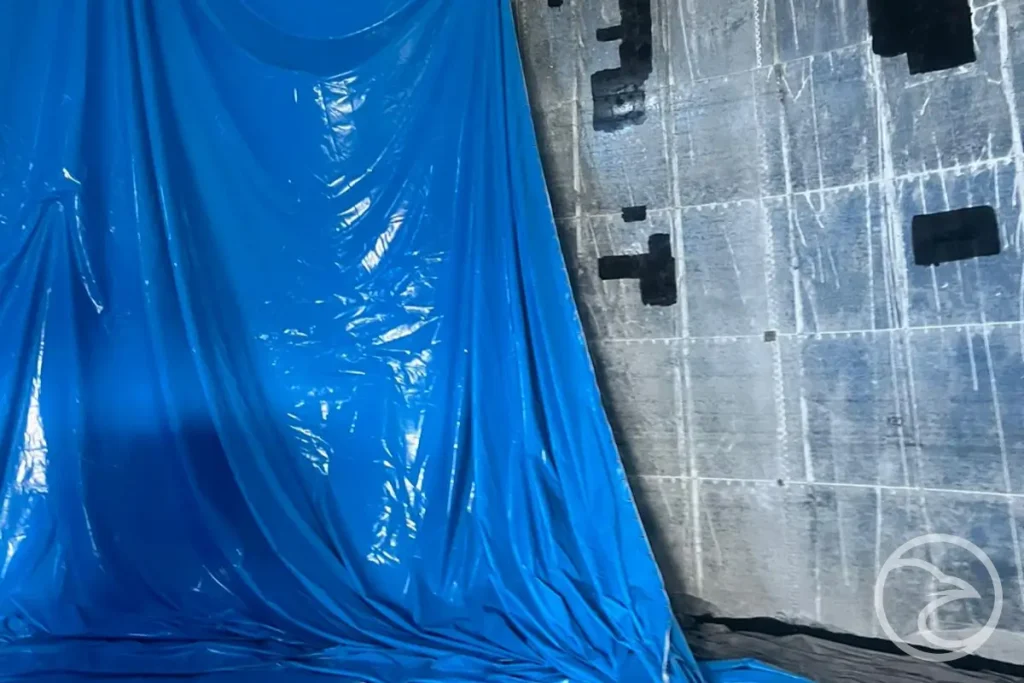 Geomembrane secondary containment liner in mining industry site
