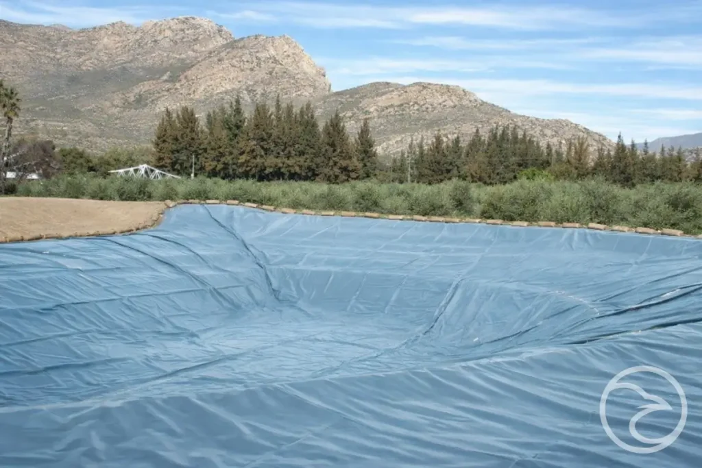 large agricultural dam with waterproof liner system