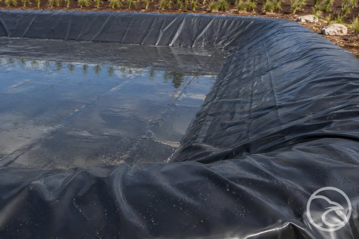 Liner installation in a bioretention basin